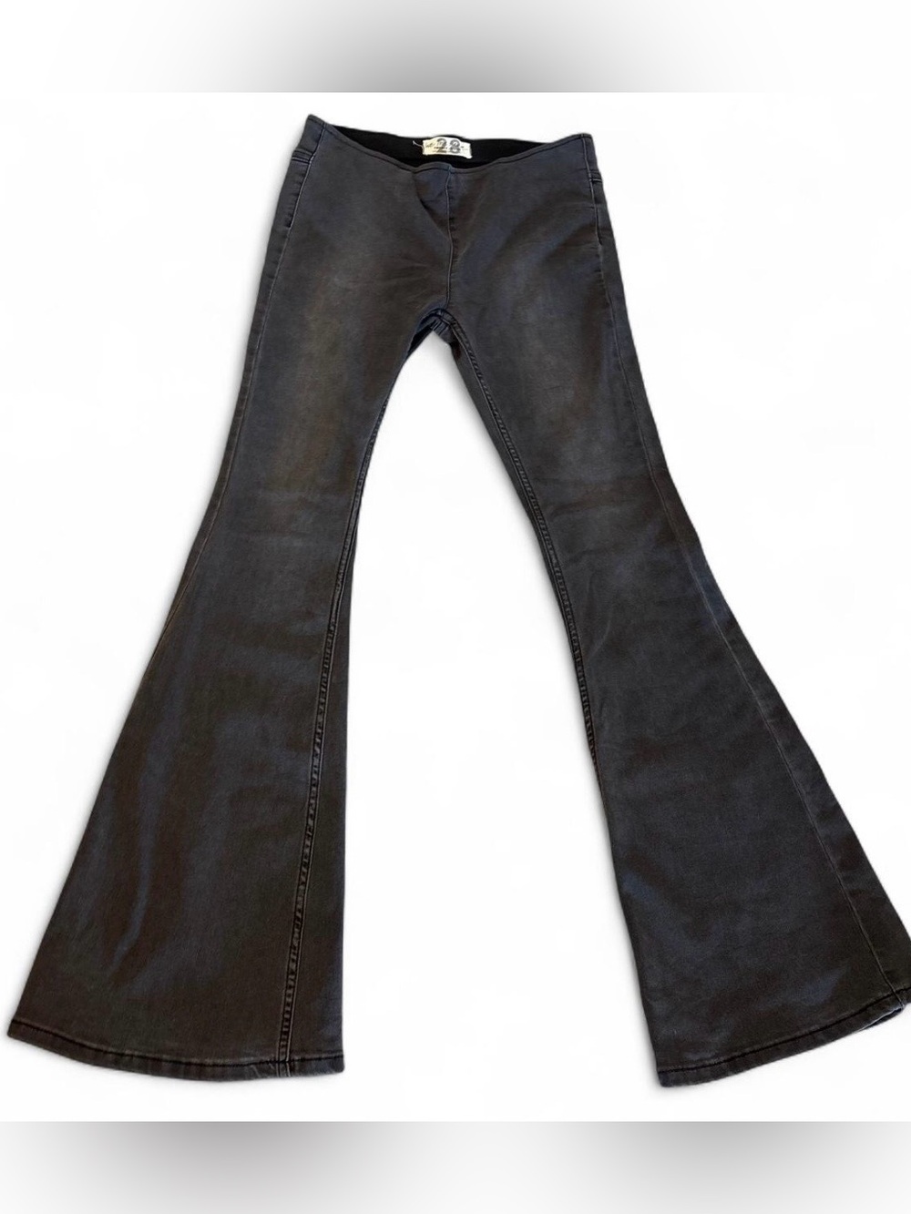 We the free Penny pull-on flare jeans featuring a faded black wash. Size 28
